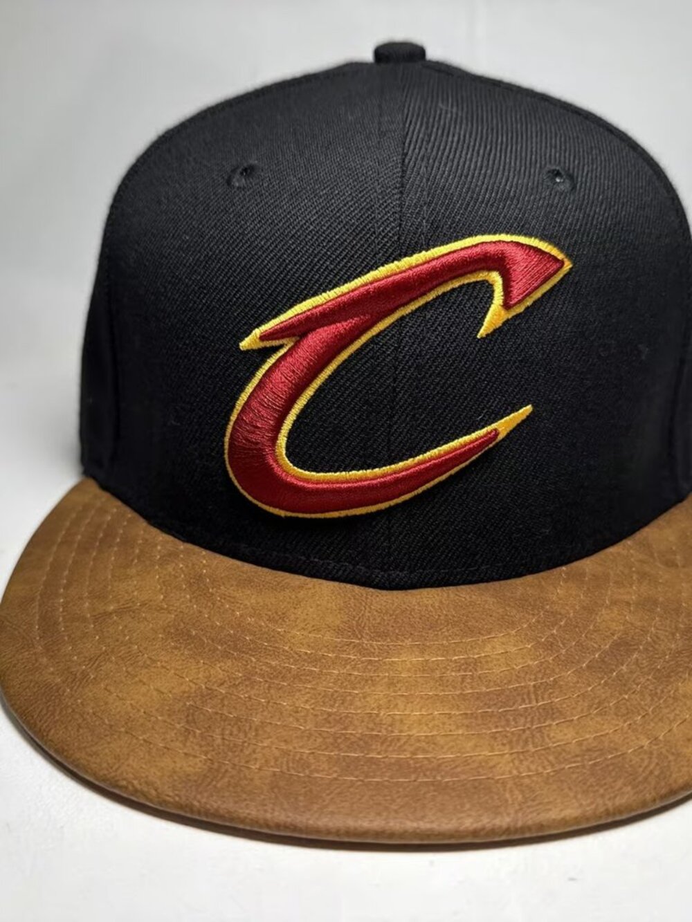 Cleveland Cavaliers Snapback Hat – Black Crown with Brown Faux-Leather Brim